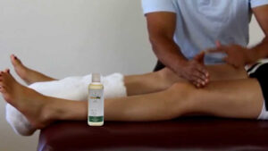 Legs being massaged with CannaFlex Hemp Massage Oil