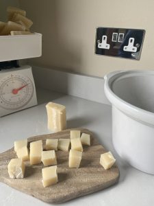 Pieces of soap on a chopping board