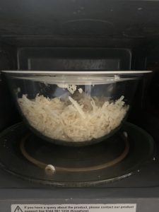 Bowl of soap scraps in a microwave